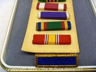 Collectible: Militaria: assortment of 9 ribbons in case from another medal