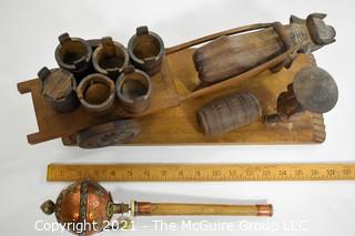 Tibetan Prayer Wheel and Vietnamese carving of Water Buffalo, Herder and Cart.