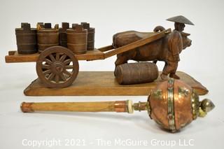 Tibetan Prayer Wheel and Vietnamese carving of Water Buffalo, Herder and Cart.