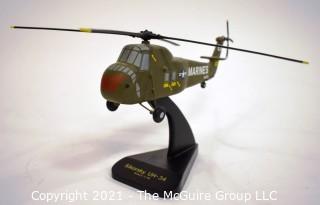 Professional Scaled Model of Marine Sikorsky UH-34 Helicopter on Stand. Hat commemorating the Restoration of the Helicopter.