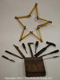 Eclectic grouping of old tools, table ware, and African thumb harp "Mbira" 