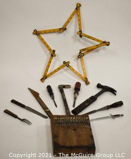 Eclectic grouping of old tools, table ware, and African thumb harp "Mbira" 