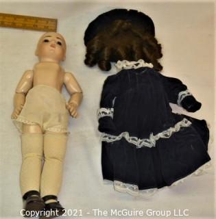 Collectible: Doll:  marked "M&M" dated 1981 bisque head doll w/ jointed composition body in royal blue outfit