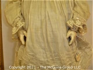 Collectible: Doll:  marked "Armand Marselle" German bisque head doll w/ jointed composition body in lace outfit