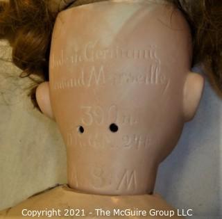 Collectible: Doll:  marked "Armand Marselle" German bisque head doll w/ jointed composition body in lace outfit