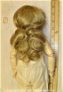 Collectible: Doll:  composition body w? German bisque head byh Handwerk 109-6  circa 1911 in red gingham dress and bonnet