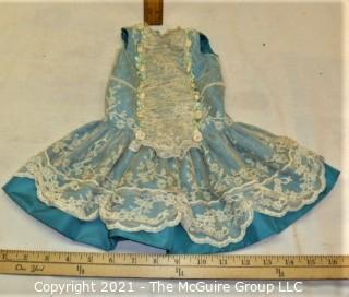 Collectible: Doll: leather and cloth soft body w/ Simon & Halbig German bisque head and socketed shoulders circa 1912 in blue dress