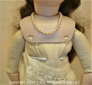 Collectible: Doll: leather and cloth soft body w/ Simon & Halbig German bisque head and socketed shoulders circa 1912 in blue dress