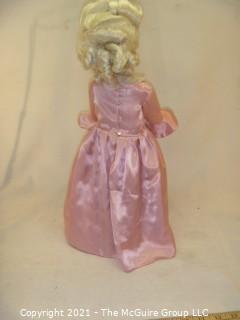 Collectible: Doll: bisque and cloth soft body w/ Simon & Halbig German bisque head and socketed shoulders circa 1912 in pink dress