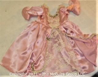 Collectible: Doll: bisque and cloth soft body w/ Simon & Halbig German bisque head and socketed shoulders circa 1912 in pink dress