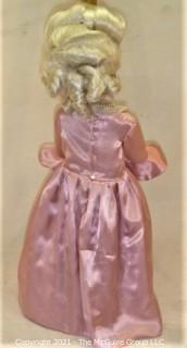 Collectible: Doll: bisque and cloth soft body w/ Simon & Halbig German bisque head and socketed shoulders circa 1912 in pink dress