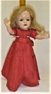 Collectible: Doll:  unmarked 11.5" doll w/ composition body  and red dress