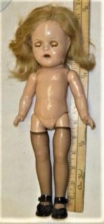 Collectible: Doll:  unmarked 11.5" doll w/ composition body  and red dress