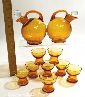 Set of Two (2) Cambridge Glass Golden Amber Lodge Barware Ball Tilt Pitchers with Clear Stopper & 7 Matching Pedestal Cordial Glasses.