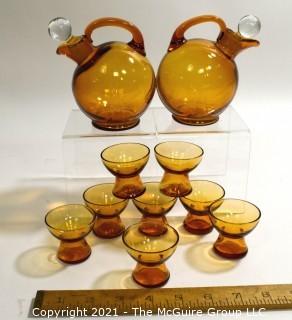 Set of Two (2) Cambridge Glass Golden Amber Lodge Barware Ball Tilt Pitchers with Clear Stopper & 7 Matching Pedestal Cordial Glasses.