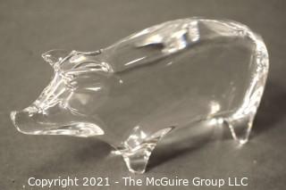 A Baccarat Clear Lead Crystal Standing Pig Figurine.  It measures approximately 1.5" W x 2.75" H x 5.5" D