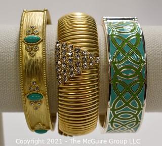 Three (3) Gold Tone Bangle Bracelts with Enamel Decoration.  One signed Stella & Dot. 