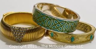 Three (3) Gold Tone Bangle Bracelts with Enamel Decoration.  One signed Stella & Dot. 