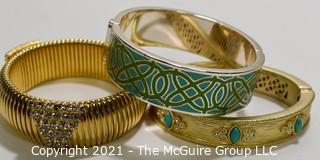 Three (3) Gold Tone Bangle Bracelts with Enamel Decoration.  One signed Stella & Dot. 