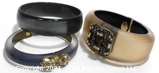 Two (2) Alexis Bittar Tapered Lucite Hinge Bracelets with Swarovski Crystals and One (1) Lucite Bangle Bracelet Unsigned.