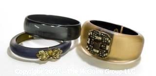 Two (2) Alexis Bittar Tapered Lucite Hinge Bracelets with Swarovski Crystals and One (1) Lucite Bangle Bracelet Unsigned.