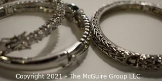 Three (3) Silver Tone Bangle Bracelets with Rhinestone Accents.