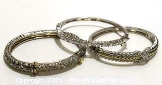 Three (3) Silver Tone Bangle Bracelets with Rhinestone Accents.