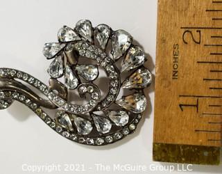 Vintage Eisenberg Original Sterling Silver Rhinestone Brooch or Pin in Flourish Design.   Measures approximately 3" Tall and 2" wide. 
