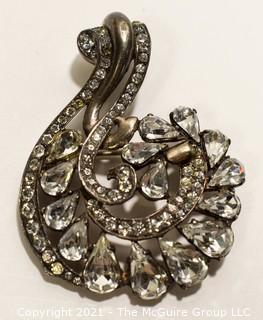 Vintage Eisenberg Original Sterling Silver Rhinestone Brooch or Pin in Flourish Design.   Measures approximately 3" Tall and 2" wide. 
