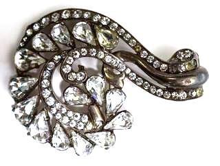 Vintage Eisenberg Original Sterling Silver Rhinestone Brooch or Pin in Flourish Design.   Measures approximately 3" Tall and 2" wide. 
