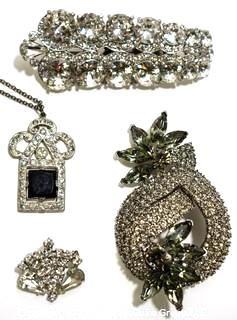 Group of Four (4) Vintage and Modern Rhinestone Encrusted Brooches & Pendants.  One marked Cabi.
