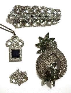 Group of Four (4) Vintage and Modern Rhinestone Encrusted Brooches & Pendants.  One marked Cabi.
