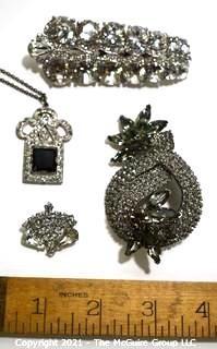 Group of Four (4) Vintage and Modern Rhinestone Encrusted Brooches & Pendants.  One marked Cabi.
