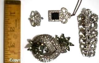 Group of Four (4) Vintage and Modern Rhinestone Encrusted Brooches & Pendants.  One marked Cabi.
