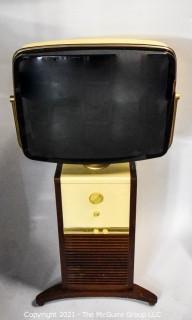 Vintage Mid Century Modern MCM "Predicta" Television in Swivel Screen Pedestal Cabinet. 
This TV has been converted to a modern monitor with Cable Plug.  Not operating. 