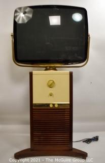 Vintage Mid Century Modern MCM "Predicta" Television in Swivel Screen Pedestal Cabinet. 
This TV has been converted to a modern monitor with Cable Plug.  Not operating. 