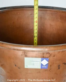 Antique Hammered Large Copper Cauldron with Hand Forged Iron Base and Handle.  Measures 43"T (with handle) x 27" D (at top).  Base Measure 14"T.  Includes wood insert. 