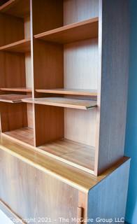 Danish Mid Century Modern (MCM)  Stacking Teak Bookcase & Credenza with Adjustable Shelves, Some Slide Out.   Stamped Made in Denmark by Poul Hundevad. Some damage to base.  