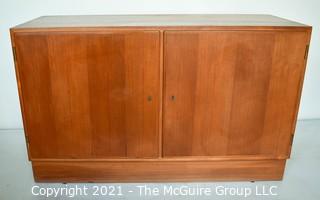 Danish Mid Century Modern (MCM) Teak Credenza or Cabinet. Stamped Made in Denmark by Poul Hundevad. Measures 42"W x 17"D x 27"T.