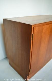 Danish Mid Century Modern (MCM) Teak Credenza or Cabinet. Stamped Made in Denmark by Poul Hundevad. Measures 42"W x 17"D x 27"T.