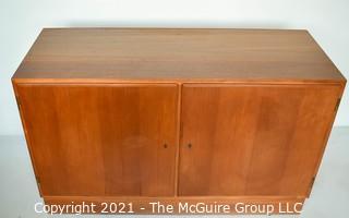 Danish Mid Century Modern (MCM) Teak Credenza or Cabinet. Stamped Made in Denmark by Poul Hundevad. Measures 42"W x 17"D x 27"T.