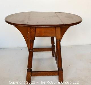 Vintage Maple Drop-Leaf End Table.  Measures 28"W x 23"T  (12"W when closed)