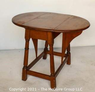 Vintage Maple Drop-Leaf End Table.  Measures 28"W x 23"T  (12"W when closed)