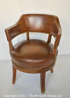 Vintage Leather Barrel Style Office Chair with Brass Tack Accents on Swivel Base.  Measures 37"T x 24" W.