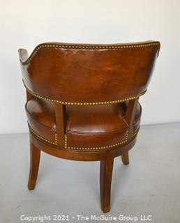 Vintage Leather Barrel Style Office Chair with Brass Tack Accents on Swivel Base.  Measures 37"T x 24" W.