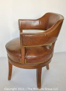 Vintage Leather Barrel Style Office Chair with Brass Tack Accents on Swivel Base.  Measures 37"T x 24" W.