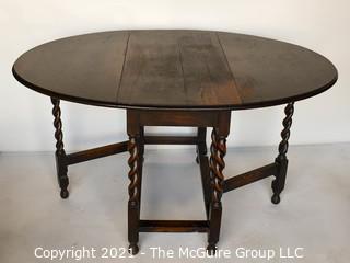 Antique English Oak Barley Twist Gateleg Table.  Measures 53" D when open.