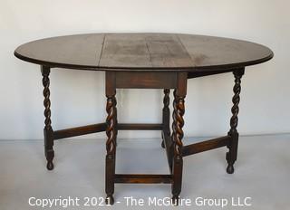 Antique English Oak Barley Twist Gateleg Table.  Measures 53" D when open.