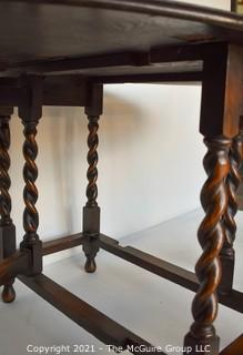 Antique English Oak Barley Twist Gateleg Table.  Measures 53" D when open.