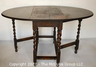 Antique English Oak Barley Twist Gateleg Table.  Measures 53" D when open.